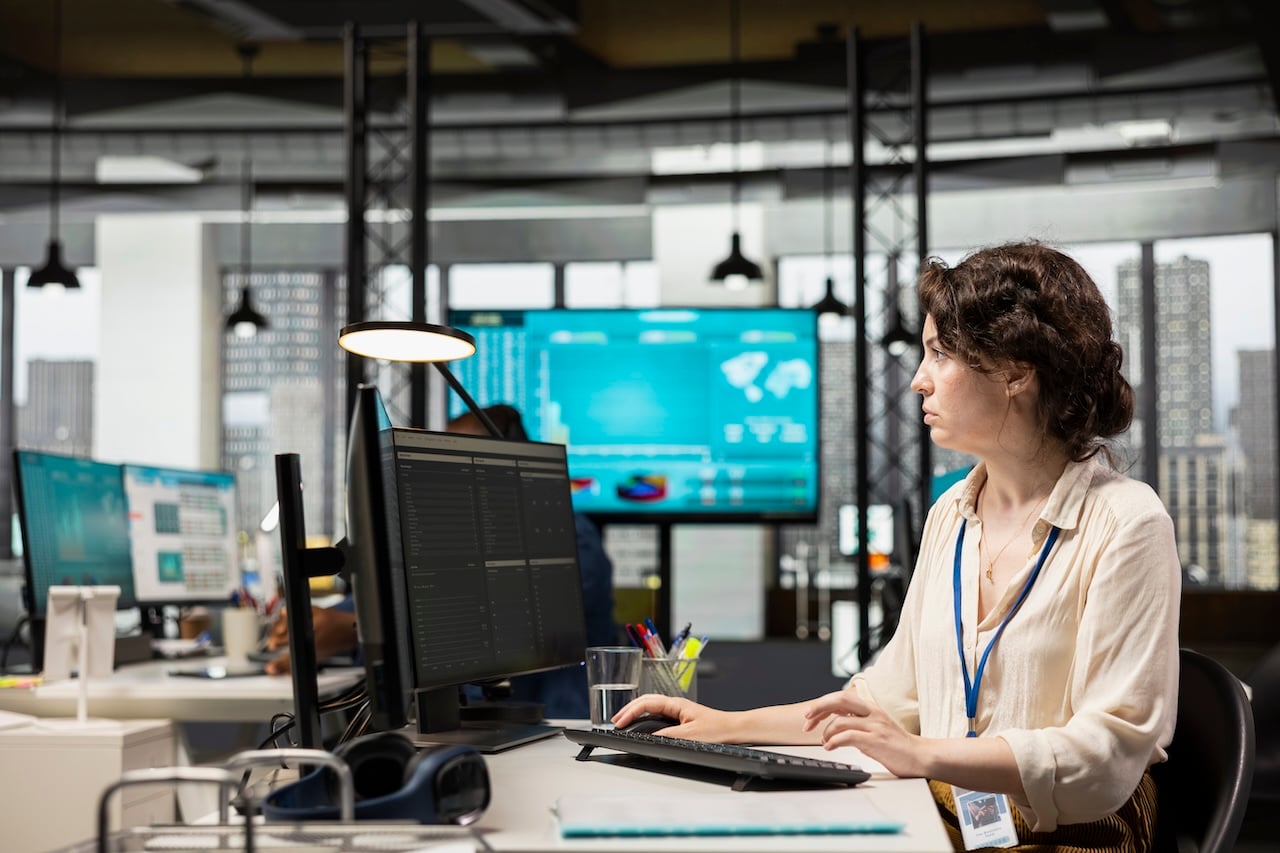 woman working at computer in modern office